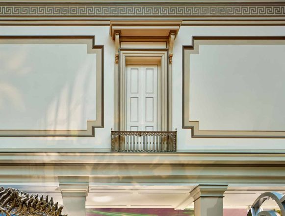 A detailed photo of Fossil Halls ornate molding which was artfully restored using traditional methods.